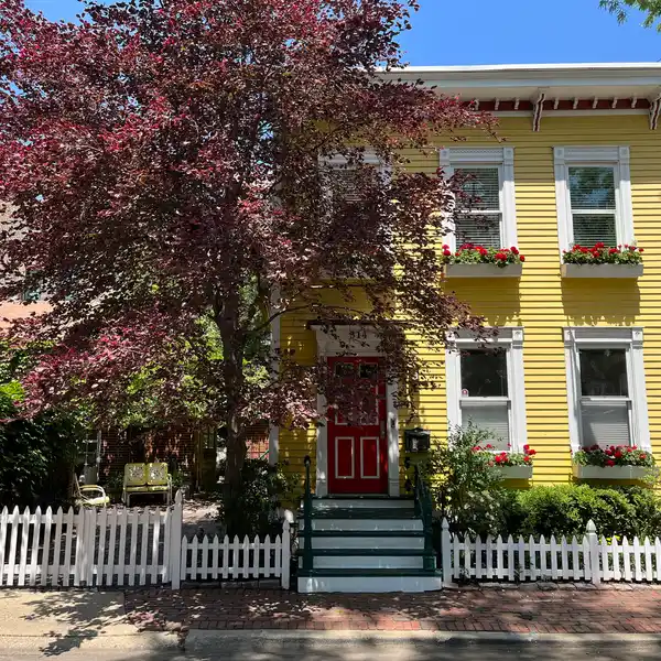 ICONIC 1875 OLD TOWN YELLOW HOUSE