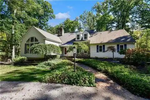 Sprawling Cape on a Magnificent Wooded Lot