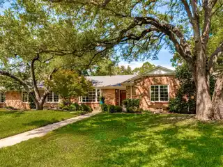 Classic Design Meets Modern Comfort on Landscaped Lot