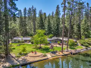 Single Level Estate Bordering a Private Lake