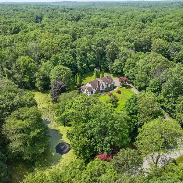 UPDATED TUDOR RETREAT ON QUIET CUL-DE-SAC