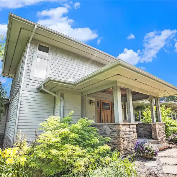 DESIGNER HOME SURROUNDED BY RARE TREES