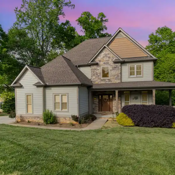 THREE-STORY HOME ON MOUNTAIN ISLAND LAKE