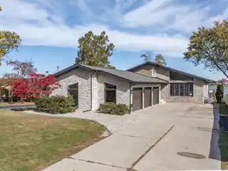 Lakefront Elegance in Exclusive Gated Community