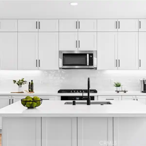 CHARM AND CONVENIENCE IN THE DESIRABLE BLOOM ENCLAVE