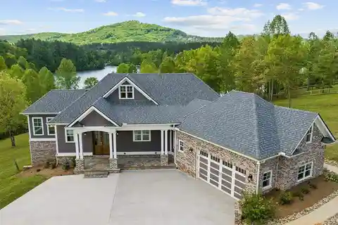 Lakefront Luxury with Mountain Views