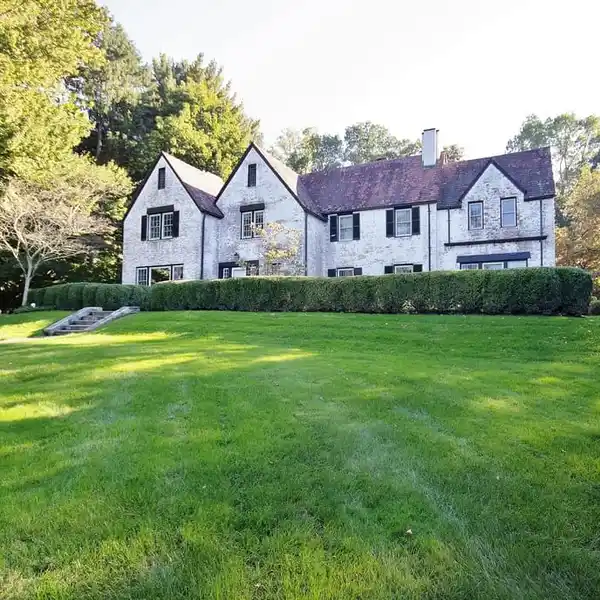 ELEGANT COLONIAL TUDOR ON A COVETED STREET