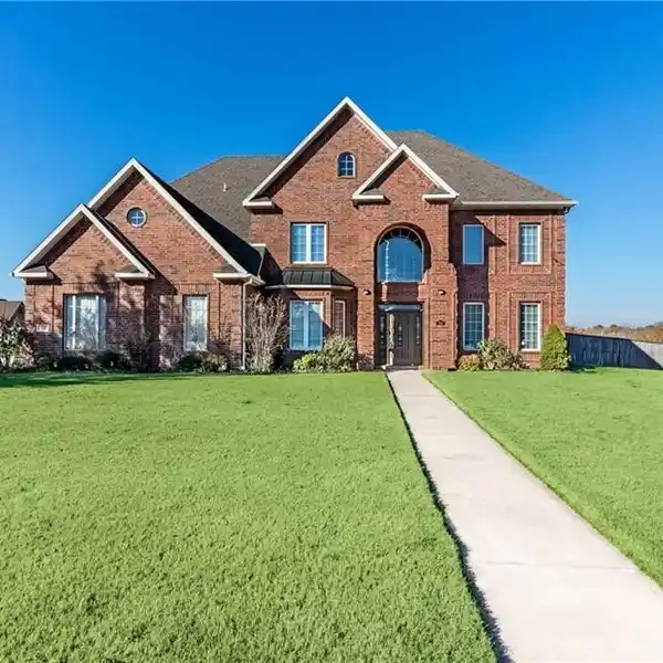 CUSTOM BUILT BRICK HOME ON A SCENIC ACRE