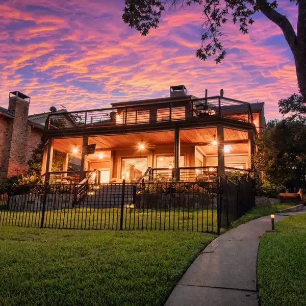 TURNKEY LAKEFRONT HOME WITH EXCEPTIONAL OUTDOOR AMENITIES