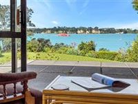 STUNNING FAMILY HOME PERCHED ABOVE THE GLENDOWIE WATERFRONT