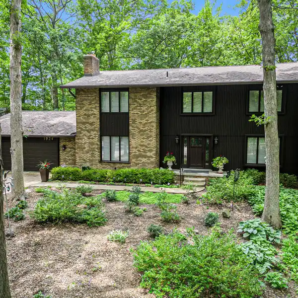 CUSTOM COLONIAL ON A WOODED CUL-DE-SAC LOT