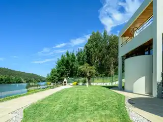 Architectural Villa with Private Mooring and Riverfront Views