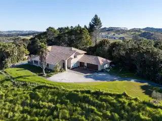 Exclusive Hilltop Haven with Sweeping Sea Views