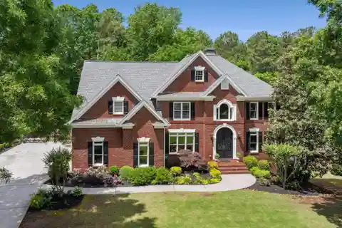 Traditional-style Masterpiece in Prestigious Falls of Autry Mill