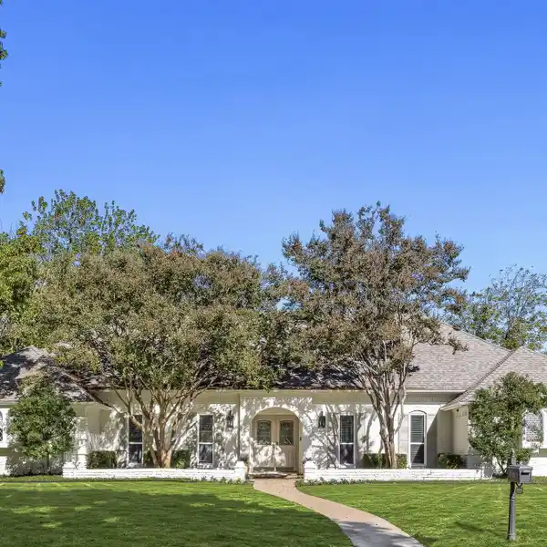 BEAUTIFULLY UPDATED TRADITIONAL HOME IN A PEACEFUL ENCLAVE