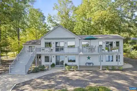 Lakefront Elegance with Docks, Beach, and Views