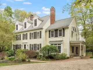 Timeless Colonial Charm on Private Acre Lot
