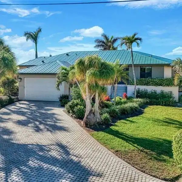 UPDATED AND METICULOUSLY MAINTAINED HOME ON THE FAIRWAY