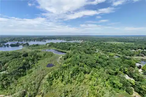 13.5-Acre Wooded Sanctuary on Commerce Lake