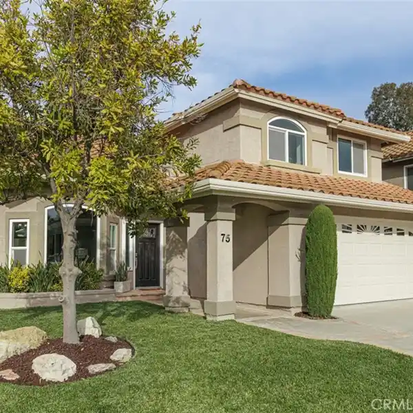 STYLISH UPDATED HOME WITH CATHEDRAL CEILINGS