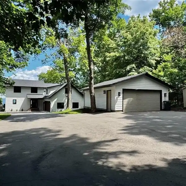 GULL LAKE LUXURY WITH 150’ SANDY SHORELINE