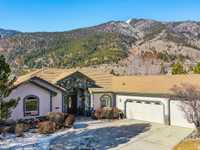 BEAUTIFUL SINGLE-LEVEL HOME ON GENOA LAKES GOLF COURSE