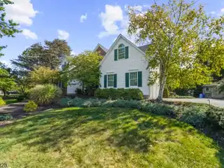 Upgraded Cul-De-Sac Colonial with Poolside Charm