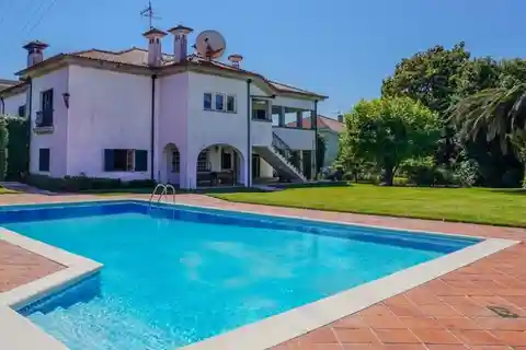 Grand Architectural Harmony with Expansive Private Oasis