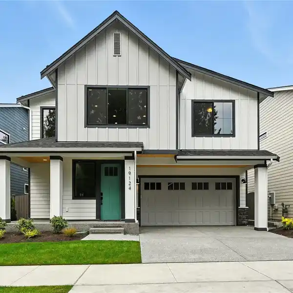 QUARTZ COUNTERS AND SLEEK CABINETRY THROUGHOUT