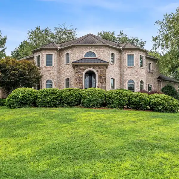 BEAUTIFULLY CRAFTED CUSTOM HOME LOCATED ON A LARGE CORNER LOT