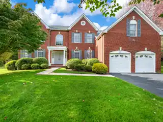 Stunning Brick Colonial Home with Timeless Elegance
