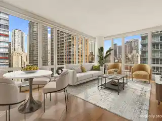 Sophisticated Corner Condo with Floor-to-ceiling Views