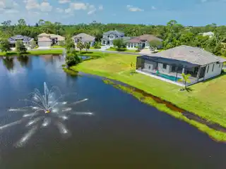 Sophisticated Waterfront Living with Designer Touches and Pool