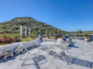 Top-Floor Apartment with Rooftop Terrace