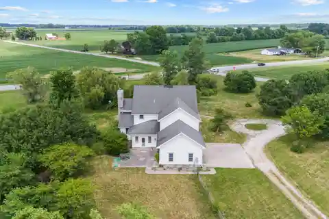 Sprawling 10-Acre Fixer with Pond and Potential