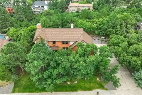 Broadmoor Bluffs Home with Mountain and City Views