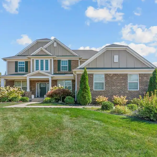 LUXURY CANTON HOME FEATURING BUTLER’S PANTRY, LIBRARY, AND SMART IRRIGATION