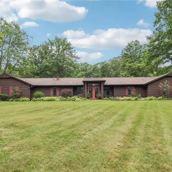 CUSTOM RANCH HOME ON PRIVATE SERENE ACREAGE