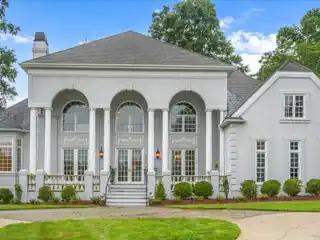 Exquisite Sedgefield Estate with Dual Golf Course Views