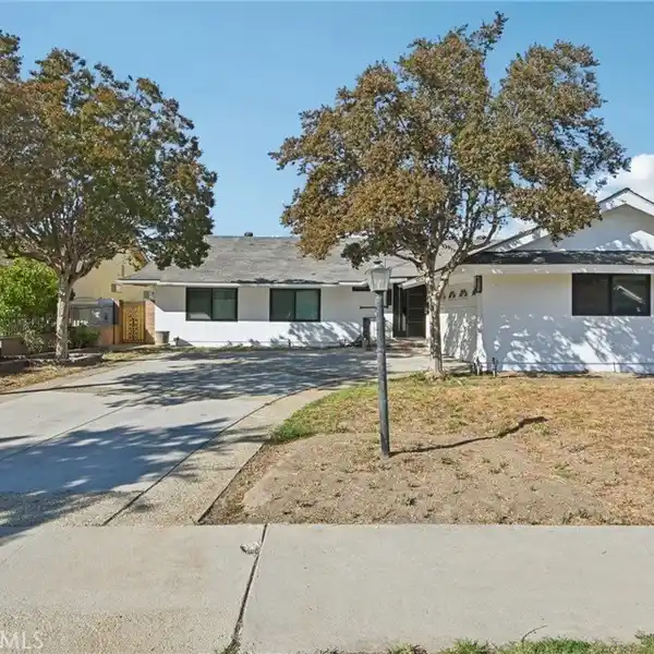 REMODELED OPEN-CONCEPT HOME WITH CHEF’S KITCHEN
