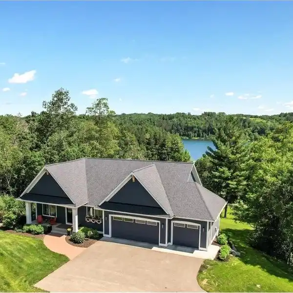 ONE-OF-A-KIND FOUR-ACRE ESTATE OVERLOOKING PERCH LAKE