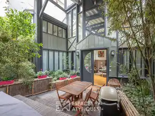 House-Style Duplex with a Green Terrace