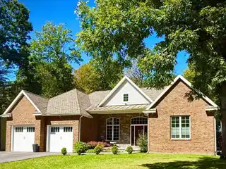 Custom Brick Beauty with Backyard Vacation Oasis