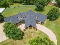 BEAUTIFUL HOME ON FIVE ACRES IN THE HEART OF CLAREMORE