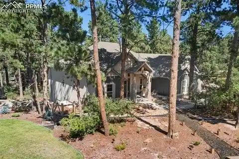 Custom Home on a Corner Lot in Coveted Chisholm