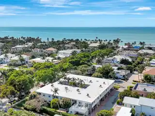Artfully Redesigned Condominium Steps to the Gulf