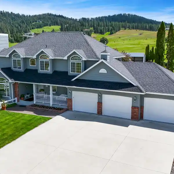 GORGEOUS TRADITIONAL HOME ON FIVE ACRES