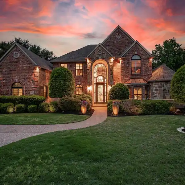 A HOME BEYOND COMPARE IN COVETED SOUTHLAKE WOODS