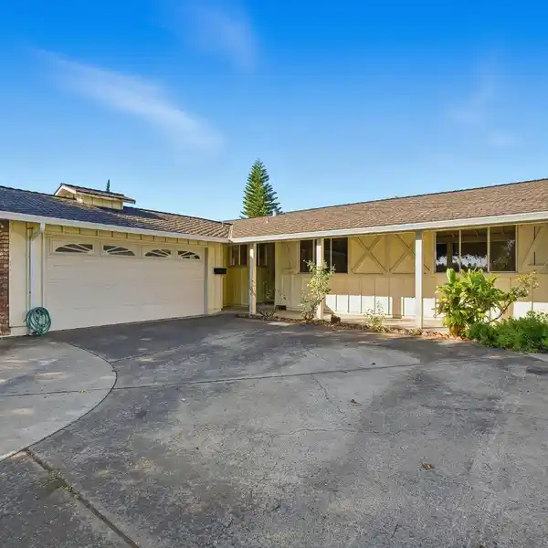 GREAT POTENTIAL IN A DESIRABLE NEIGHBORHOOD