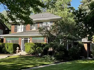 Central River Forest Home on a Stately Block